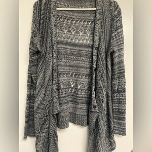 Maurice’s black and white knit sweater